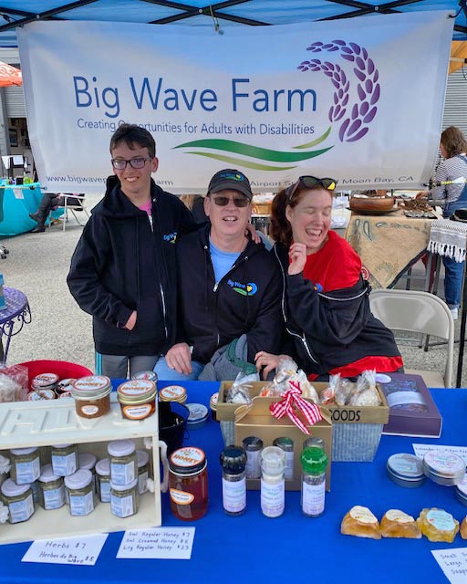 Big Wave Farm produce and farm goods stand at community farmers market